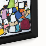 Close-up of a framed abstract geometric canvas artwork showcasing vibrant colors and intricate patterns, perfect for modern home decor and artistic expression.