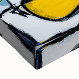 Close-up of an abstract geometric stretched canvas artwork, showcasing vibrant colors and intricate shapes, perfect for modern home decor or art enthusiasts.