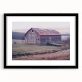 Black barn frame showcasing a landscape artwork with a mat, highlighting intricate details and vibrant colors, perfect for home decor enhancement.
