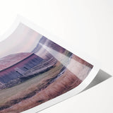 Landscape barn print on rolled canvas showcasing vibrant colors and intricate details, presented in a protective cardboard tube, ideal for home decor.