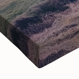 Close-up of a textured stretched canvas showcasing a vibrant landscape barn design, perfect for rustic home decor, highlighting warm earth tones and intricate details.