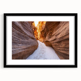 Framed landscape artwork showcasing vibrant canyons in rich hues, featuring a sleek black mat and frame, perfect for enhancing home decor. This eye-catching piece adds depth and color to any room.