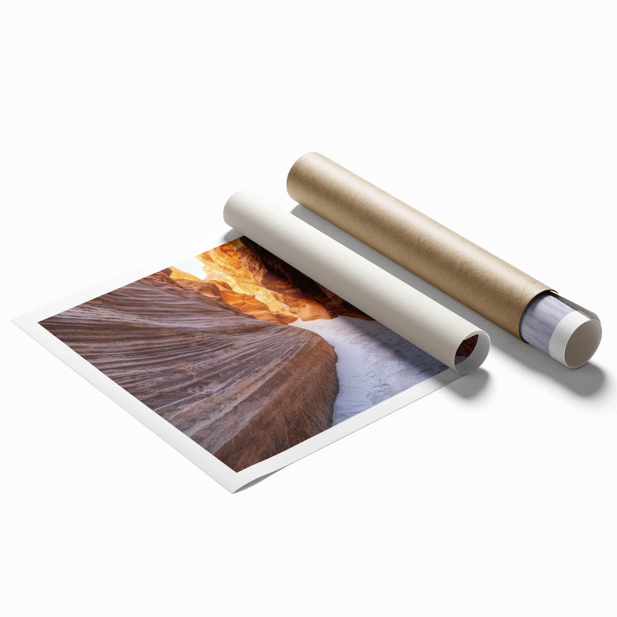 Vibrant landscape print showcasing majestic canyons in warm earthy tones, rolled and ready for display, perfect for enhancing home decor with natural beauty.