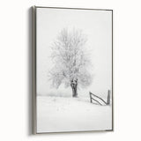 Framed canvas artwork showcasing a serene countryside landscape with rolling hills and a vibrant sunset, elegantly displayed with a sleek silver frame, ideal for home decor.