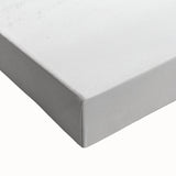 Close-up of a stretched canvas depicting a serene countryside landscape with rolling hills, vibrant green fields, and a clear blue sky, perfect for home decor.