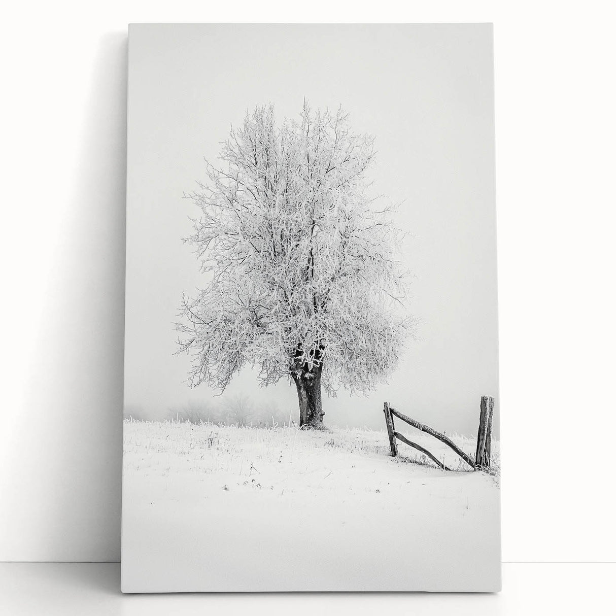 Stretched canvas artwork showcasing a vibrant countryside landscape with rolling hills and a clear blue sky, leaning against a rustic wall, perfect for home decor.