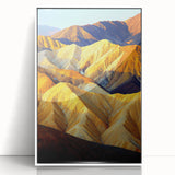 Framed acrylic landscape art depicting a vibrant desert scene with warm orange and red tones, showcased in a sleek white frame, perfect for modern decor.