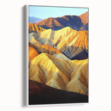 Framed canvas artwork showcasing a vibrant desert landscape with warm tones of orange and yellow, set against a white frame, perfect for modern home decor.