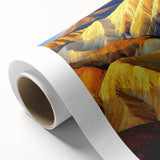 Desert landscape rolled canvas artwork showcasing vibrant hues of orange and yellow, capturing the essence of a serene sunset over sand dunes, elegantly packaged in a protective cardboard tube.