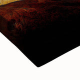 Close-up of a stretched canvas showcasing a vibrant desert landscape with warm tones of orange, red, and yellow, ideal for home decor and art enthusiasts.