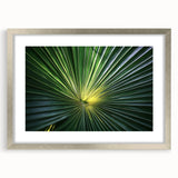 Textured art depicting abstract florals in muted green and white on a framed silver canvas, suitable for bedroom decor.