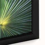 Close-up of textured black wall art featuring vibrant floral designs on a framed canvas, suitable for living room decor.