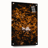 Large abstract wall art depicting autumnal trees in earthy orange and brown tones.