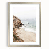 Textured abstract art print in vibrant orange and yellow tones, framed in silver, ideal for bedroom decor.