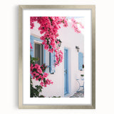 Textured abstract art print in silver frame, featuring swirling gray and white patterns, ideal for modern bedroom decor.