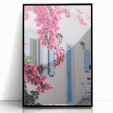 Large abstract wall art featuring swirling blue and gold patterns on a black acrylic print.