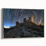 Framed canvas artwork showcasing a picturesque landscape with a majestic castle, elegantly bordered in silver, perfect for enhancing home decor and creating a sophisticated atmosphere.