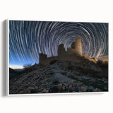 Framed canvas print showcasing a picturesque landscape with a majestic castle, featuring vibrant colors and intricate details, viewed from the side against a neutral backdrop. Ideal for home decor enthusiasts seeking to enhance their living space with artistic elegance.