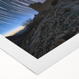 Rolled canvas artwork displaying a vibrant landscape featuring an ornate castle surrounded by lush greenery and a clear blue sky, perfect for home decor.