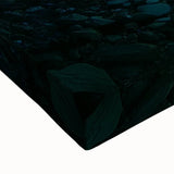 Close-up of a stretched canvas artwork depicting a serene landscape with intricate cave formations, showcasing vibrant colors and detailed textures, ideal for home decor.