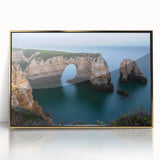 Framed acrylic artwork depicting vibrant coastal cliffs, with golden accents enhancing the scenery. Ideal for modern home decor, this piece adds a touch of elegance.