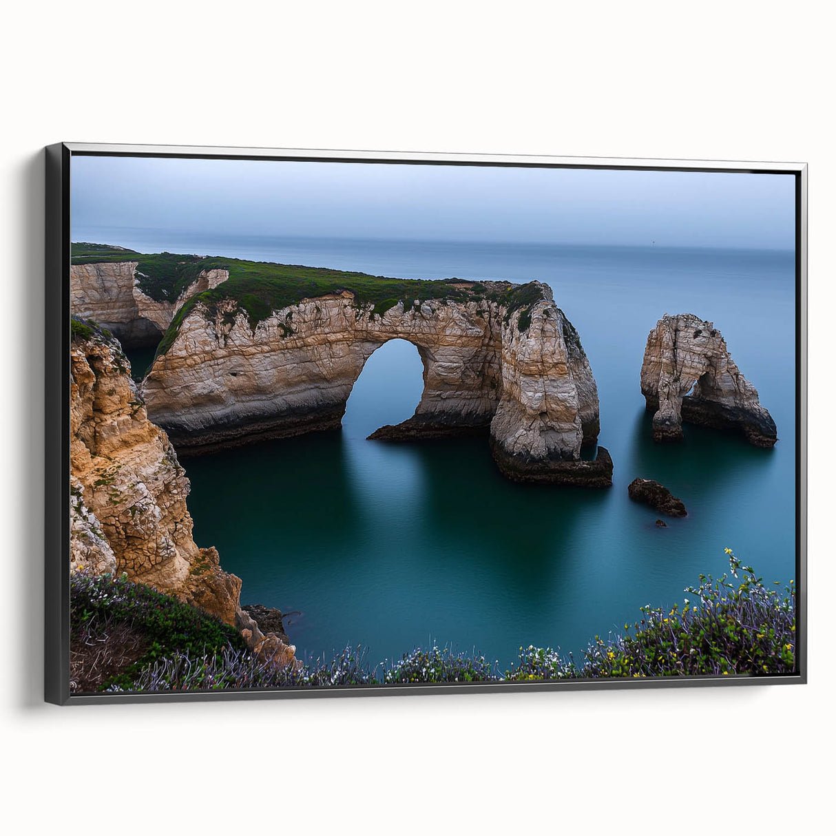 Framed canvas artwork showcasing a breathtaking cliff landscape with rich colors and dramatic textures, presented in a sleek black frame, ideal for home decor.