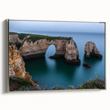 Framed canvas artwork showcasing a scenic cliff landscape in vibrant colors, with a silver frame, ideal for enhancing modern home decor. Perfect for nature enthusiasts.