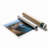 Stunning rolled print of a cliffside landscape showcasing vibrant colors and intricate details, elegantly packaged in a protective cardboard tube for easy display.