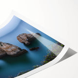 Stunning landscape canvas print showcasing dramatic cliffs under a vibrant sunset, rolled for easy transport and storage, perfect for home decor enhancement.