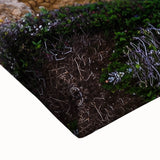 Close-up of a vibrant stretched canvas depicting dramatic cliffs at sunset, showcasing rich colors and intricate textures, perfect for enhancing any living space decor.