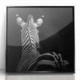 Framed acrylic wall art featuring a vibrant animal design, set against a black background. Perfect for adding a modern touch to home decor or office spaces.