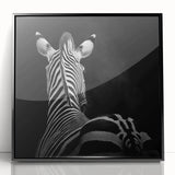 Framed acrylic wall art featuring a vibrant animal design, set against a black background. Perfect for adding a modern touch to home decor or office spaces.