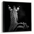 Framed canvas artwork showcasing a detailed animal design with a black border, viewed from the side, perfect for home decor or wildlife enthusiasts.