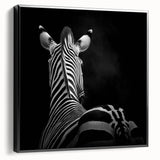 Framed canvas artwork showcasing a detailed animal design with a black border, viewed from the side, perfect for home decor or wildlife enthusiasts.