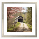 Textured art print of an abstract covered bridge in muted gray tones on a framed silver mat, ideal for modern bedroom decor.
