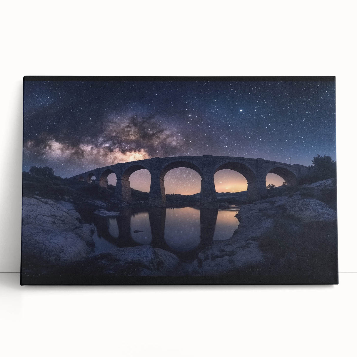Stretched canvas artwork depicting a serene landscape bridge scene over tranquil waters, featuring vibrant colors and intricate details, perfect for home decor.