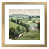 Framed landscape wall art depicting a serene countryside scene, featuring lush green fields and a vibrant blue sky, elegantly bordered with a gold mat, perfect for home decor.