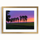 Gold-framed landscape artwork showcasing a serene countryside scene, elegantly matted for a sophisticated look, ideal for enhancing home decor and aesthetics.
