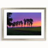 Silver-framed landscape print showcasing a serene countryside scene with a mat, perfect for home decor. Ideal for enhancing living spaces with nature-inspired art.