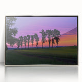 Framed acrylic artwork depicting a serene countryside landscape, featuring rolling hills in vibrant greens and a clear blue sky, ideal for home decor.