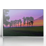 Framed acrylic landscape artwork showcasing a serene countryside scene with lush greenery and rolling hills, presented in a sleek white frame, perfect for home decor.