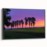 Framed canvas artwork depicting a serene countryside landscape in muted tones, showcasing rolling hills and a tranquil sky, perfect for home decor or office spaces.