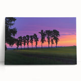 Vibrant countryside landscape stretched canvas artwork, depicting rolling green hills and a serene blue sky, perfect for adding a touch of nature to home decor.