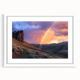 Framed desert landscape artwork with a white mat, showcasing warm earth tones and intricate details, perfect for home decor and enhancing interior aesthetics.