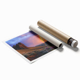 Desert landscape rolled canvas print showcasing vibrant orange and yellow hues reflecting a stunning sunset, elegantly packaged in a protective cardboard tube for easy transport.