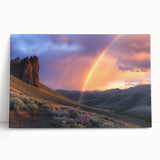 Desert landscape stretched canvas art showcasing vibrant oranges and yellows of a sunset, leaning against a neutral wall, perfect for home decor. Ideal for adding warmth and natural beauty to living spaces.