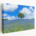 Stretched canvas artwork depicting vibrant landscapes of golden fields under a blue sky, showcasing depth and texture, ideal for home decor or art enthusiasts.