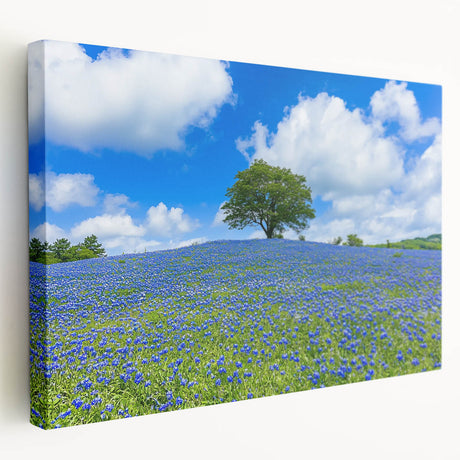 Stretched canvas artwork depicting vibrant landscapes of golden fields under a blue sky, showcasing depth and texture, ideal for home decor or art enthusiasts.