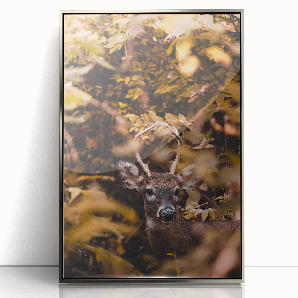 Mid-century modernist art featuring autumnal trees in muted earth tones, framed in silver acrylic.
