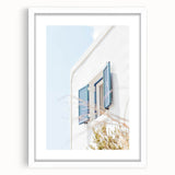 Abstract art print featuring swirling blue and white patterns on a framed canvas, suitable for dining room or bedroom decor.